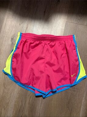 Nike Bright Pink Running Shorts with Blue & Neon Yellow Accents